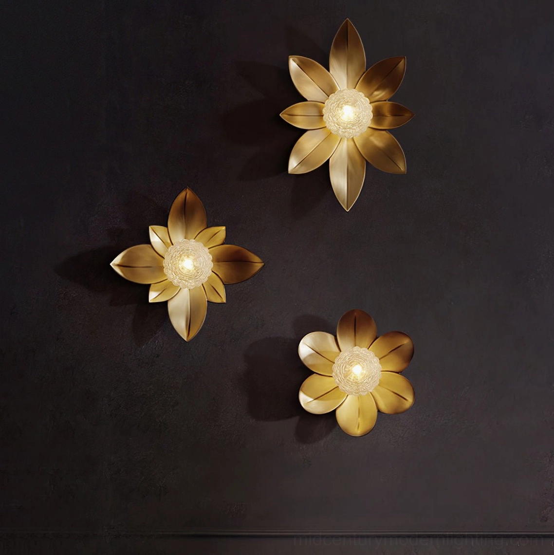Set of Gigi floral wall lamps with elegant warm glowing decorative lighting effect