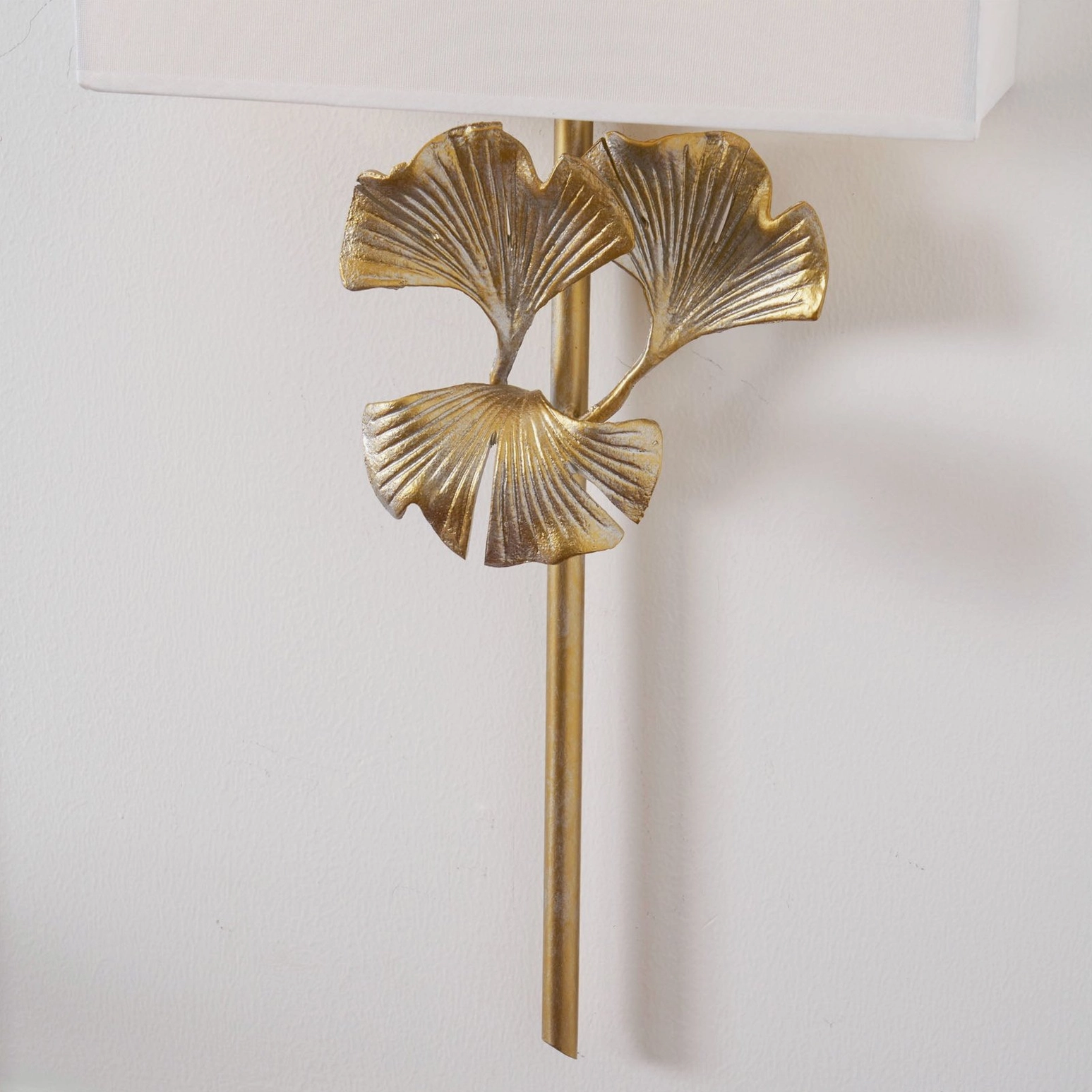 Gingko wall lamp installed in contemporary bedroom nightstand lighting setup