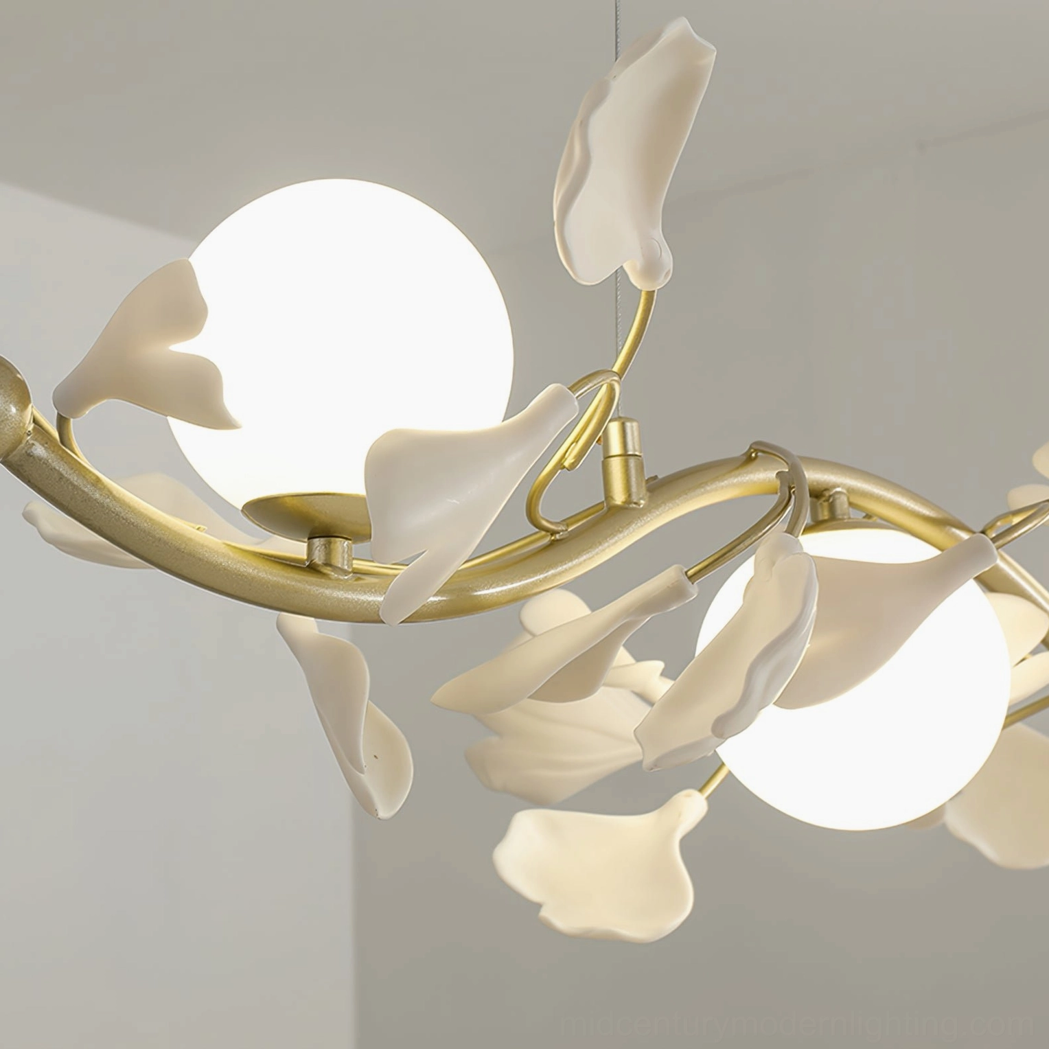 Close-up detailed view of Ginkgo Glass Chandelier showing precision-cut frosted ginkgo leaf glass ornaments and ceramic stems