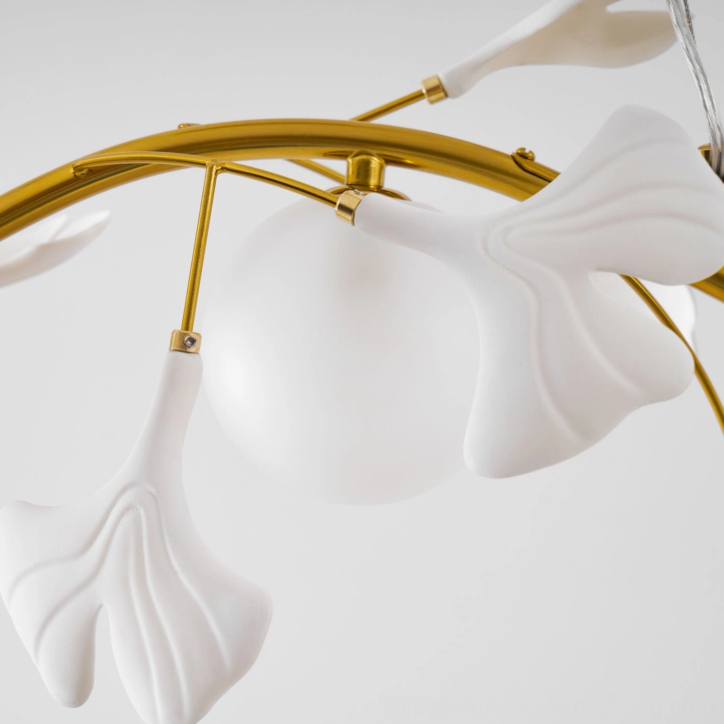 Ginkko Glass Chandelier installation details showing white ceramic stem sockets and glass leaf connection