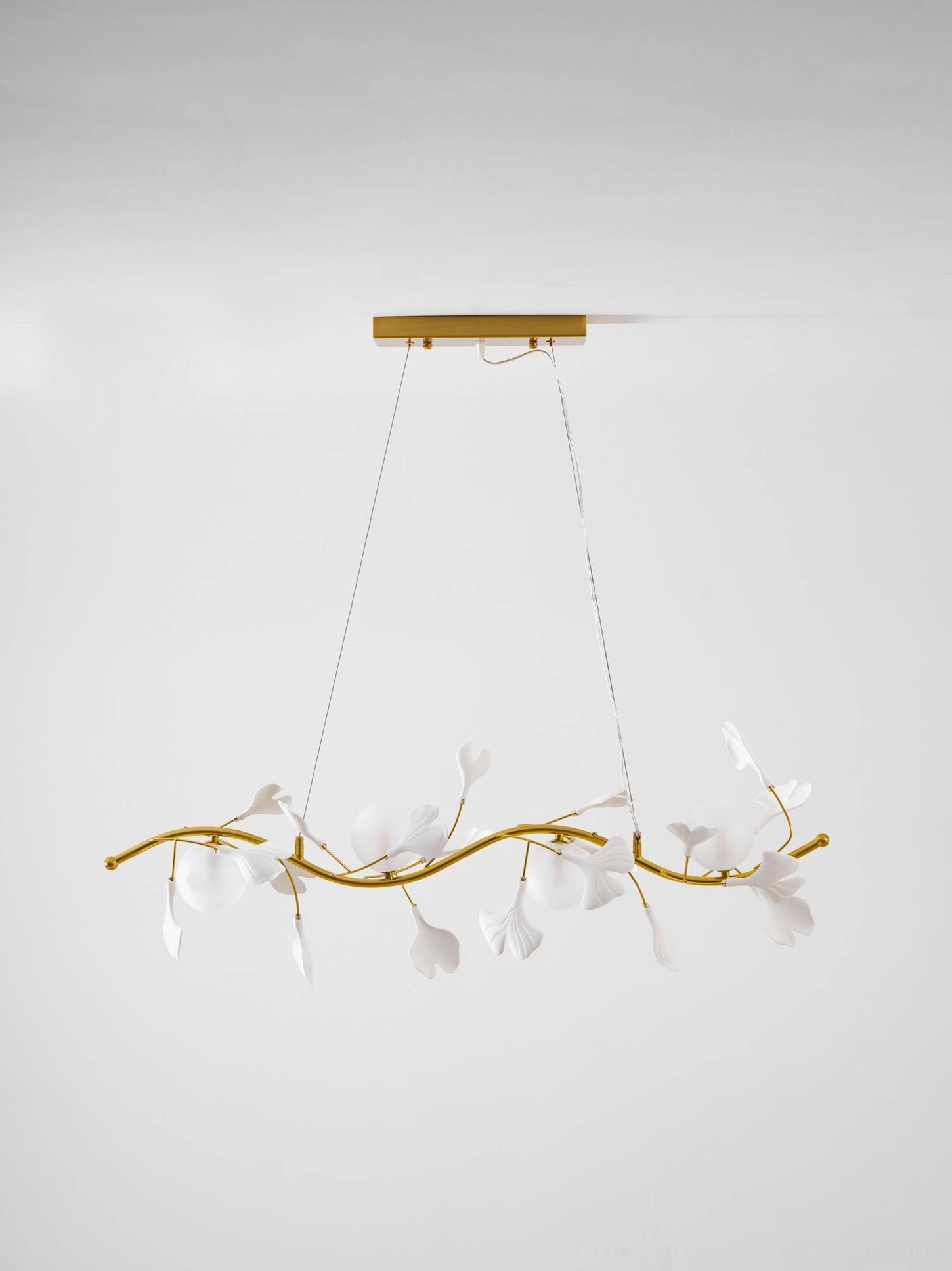 Ginkko Glass Chandelier linear arrangement of precision-cut frosted glass leaves on slim brass arm