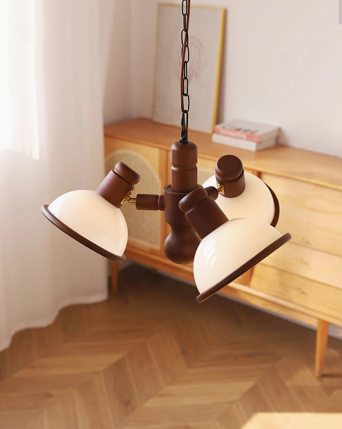 Girona Mia 3-head branch chandelier side view in contemporary interior with herringbone wood flooring and warm ambient lighting