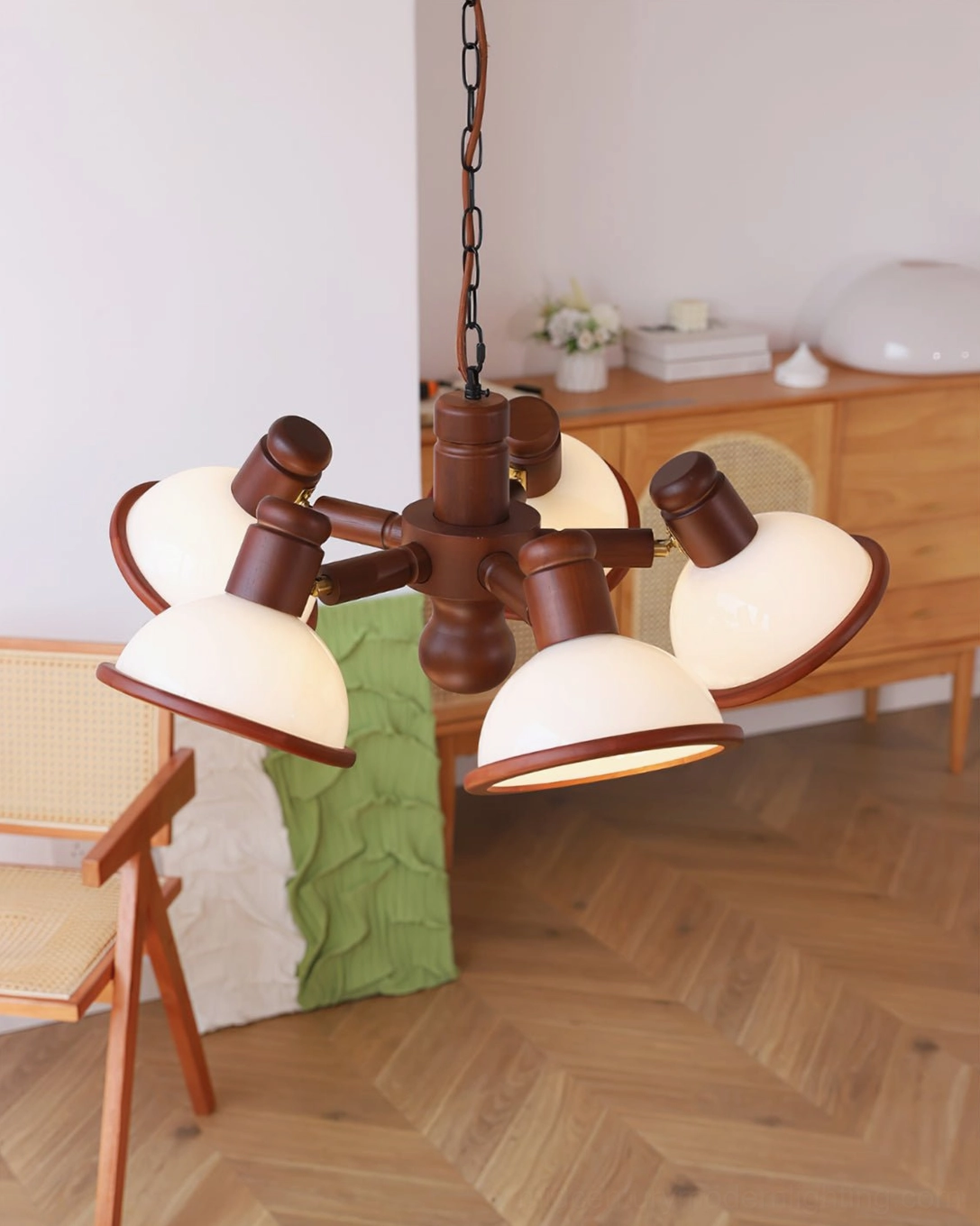 Girona Mia 5-head large chandelier in rustic farmhouse living room with wooden furniture and vintage aesthetic