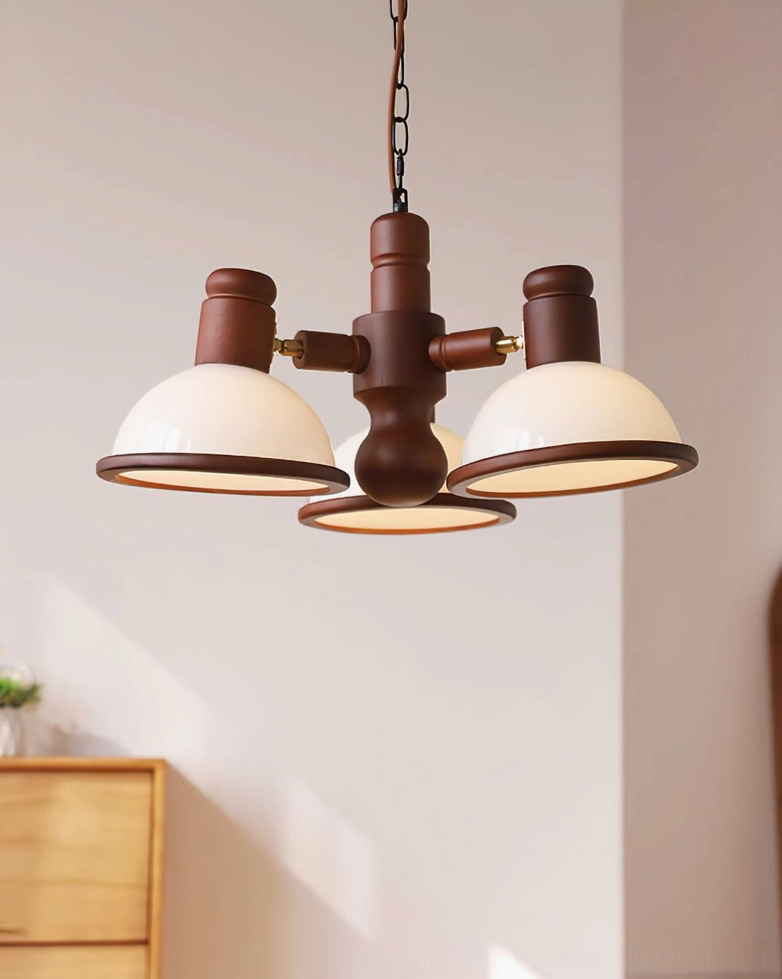 Girona Mia 3-head wooden branch pendant light against plain wall, showcasing compact mid-century modern design