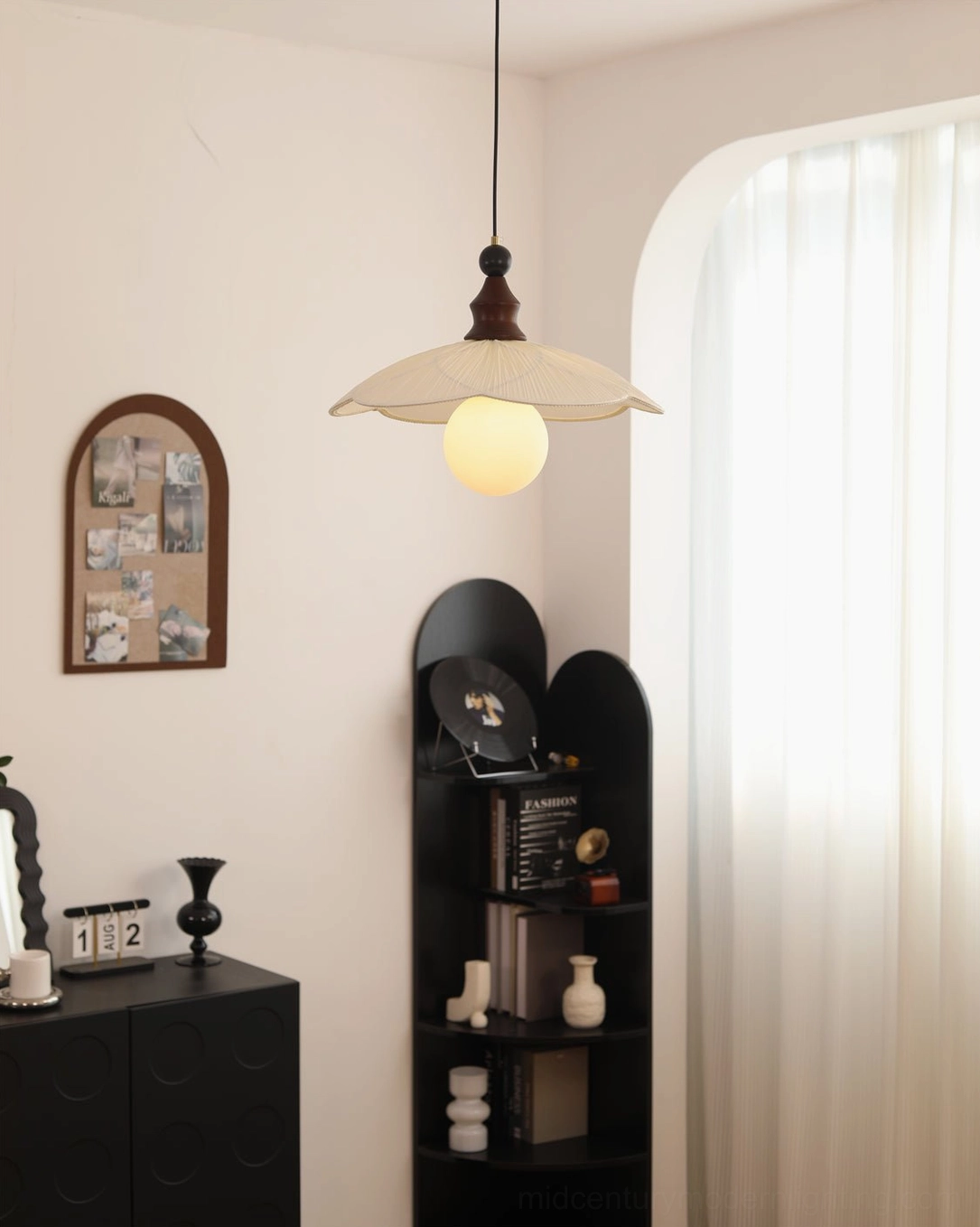 Giselle pendant light beside minimalist wall art - contemporary side view with black shelving unit