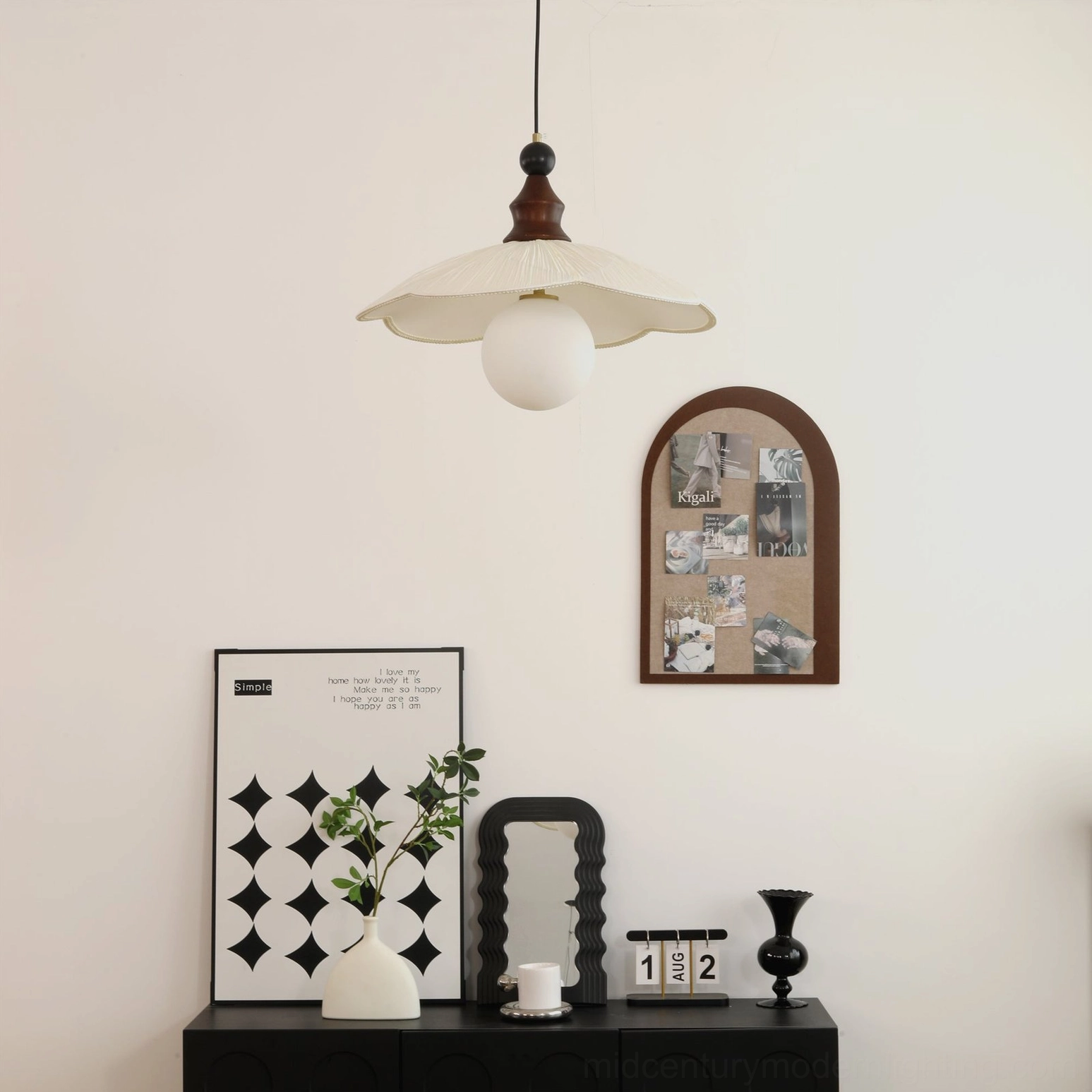 Giselle pendant light tabletop display - geometric wall art and potted plant styling showcase