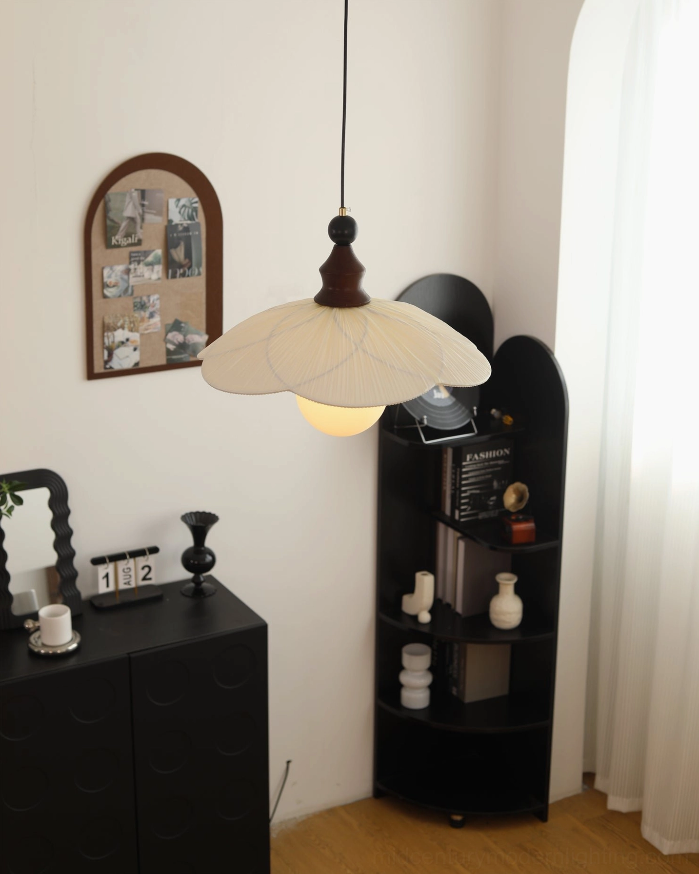 Giselle pleated pendant light in eclectic vintage corner - black cabinet and decorative arch wall display