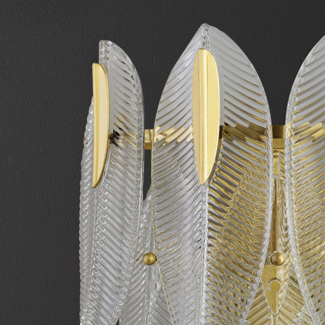 Giulia mid-century modern brass wall lamp installed in entryway creating sophisticated first impression