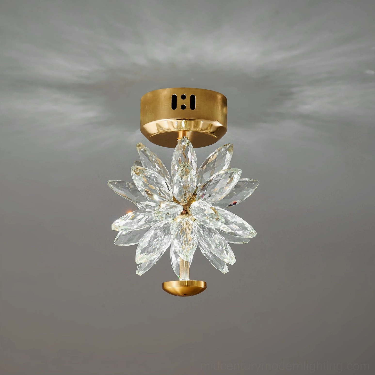 Glam flower ceiling lamp illuminated view showing light diffusion through crystal petals gold finish