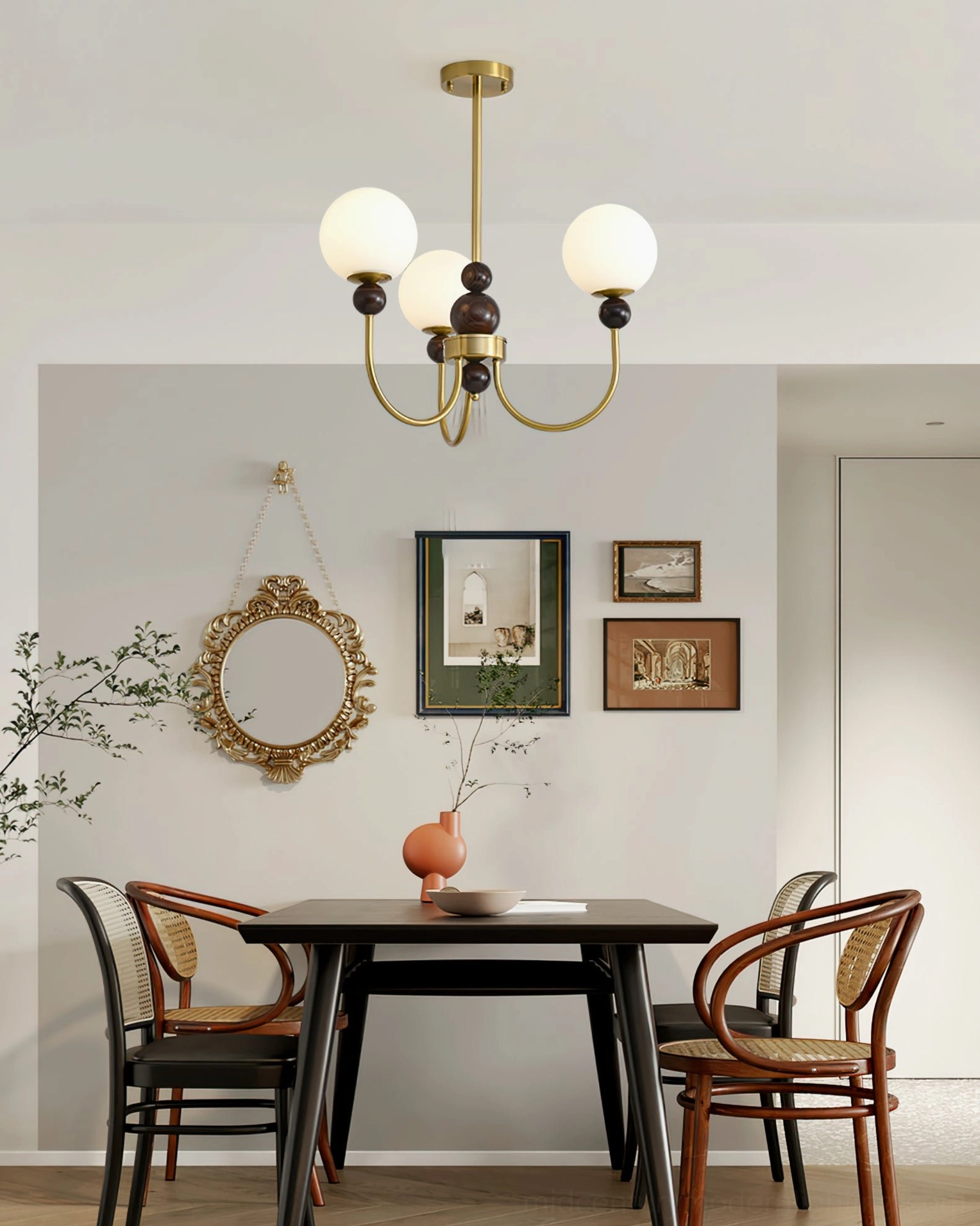 Modern glass pendant chandelier with frosted spheres and metal framework, close-up detail view