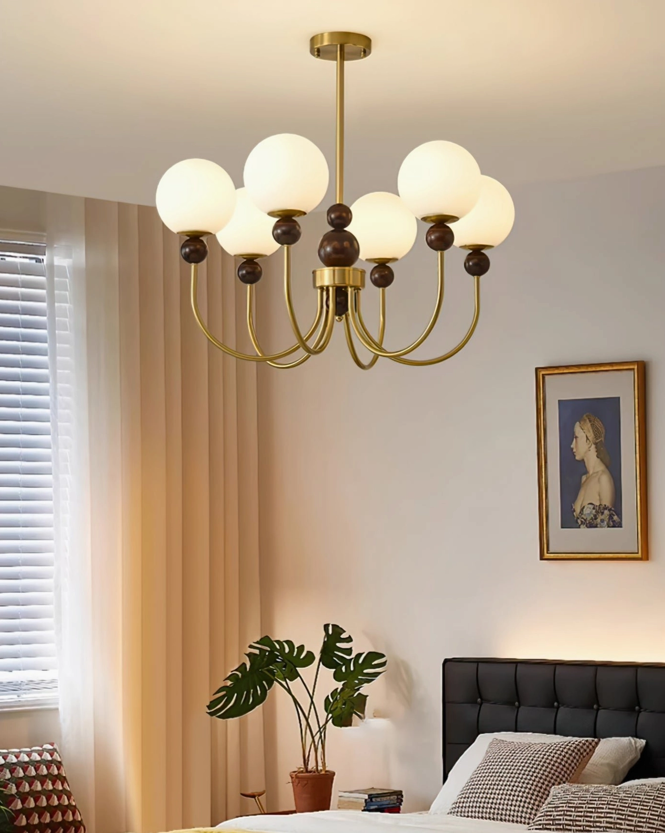 Contemporary glass chandelier with metal framework, side angle architectural view