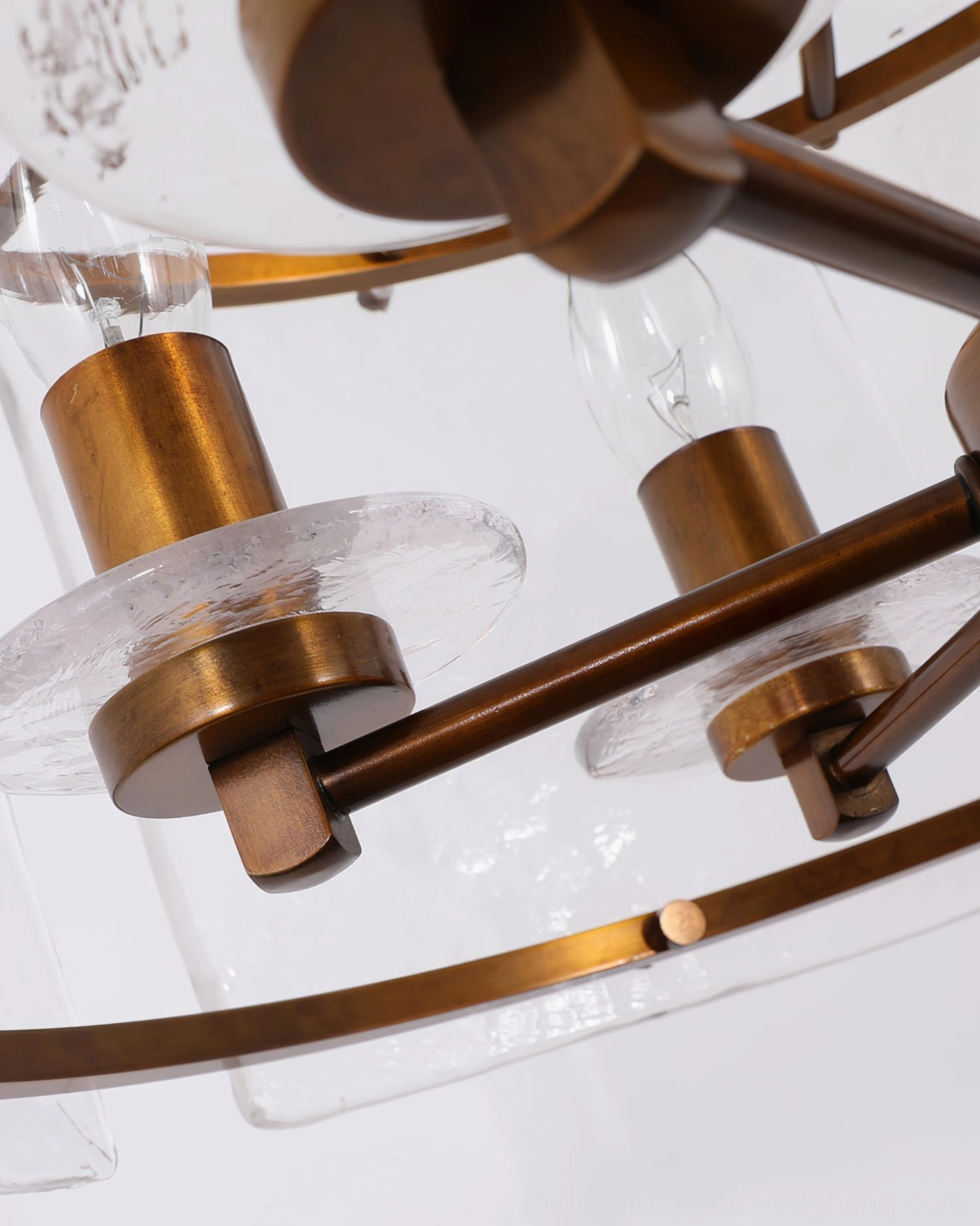 Glenn Round Chandelier frame assembly - bronze metal framework and minimalist industrial hardware