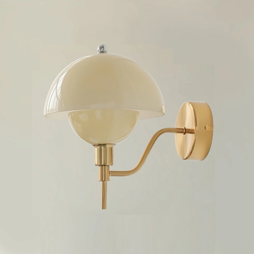Gold and cream anchored orb wall lamp demonstrating warm finish combination in mid-century modern interior