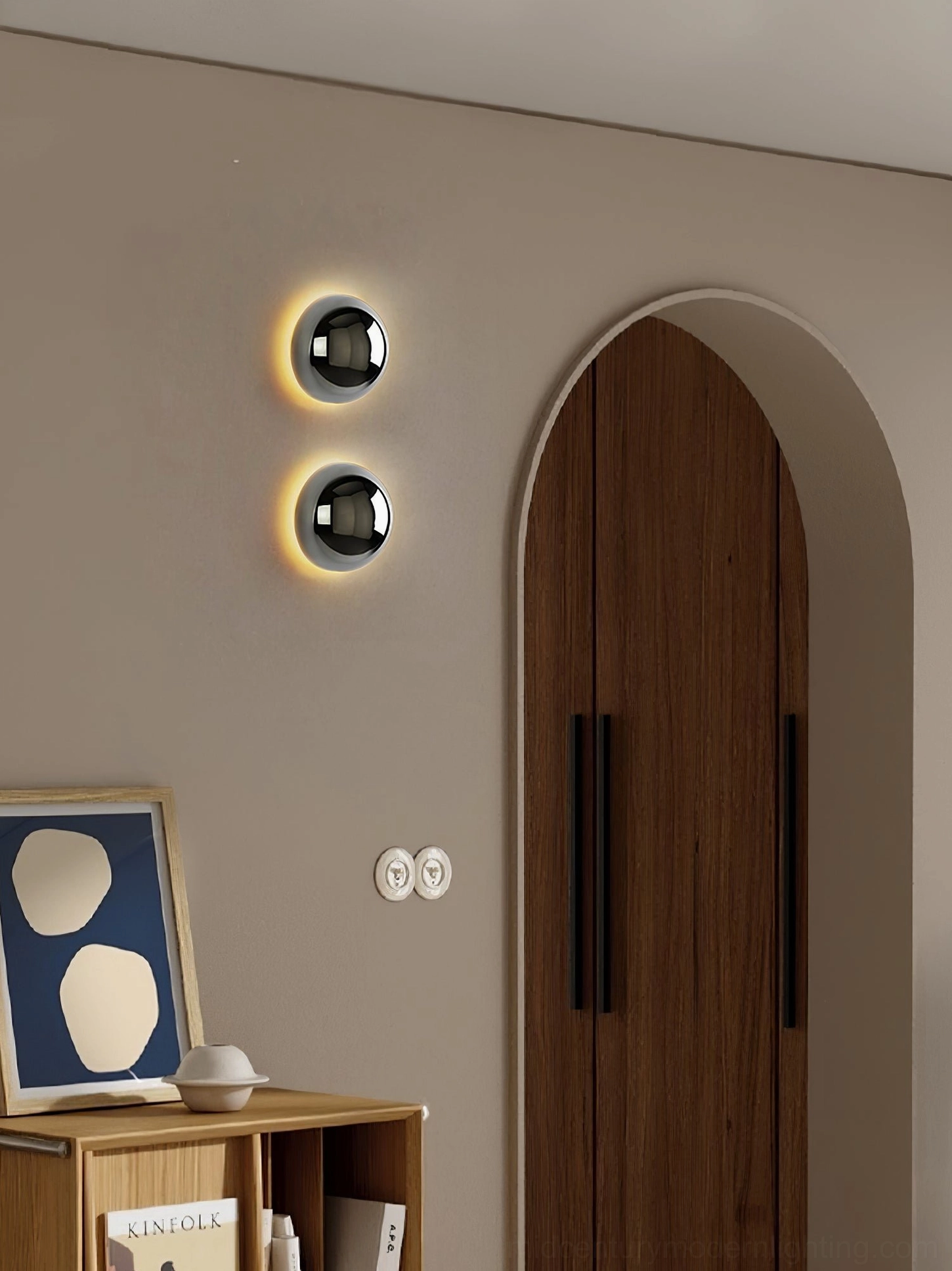 Geometric dome wall sconce in brushed gold finish for luxury interior styling