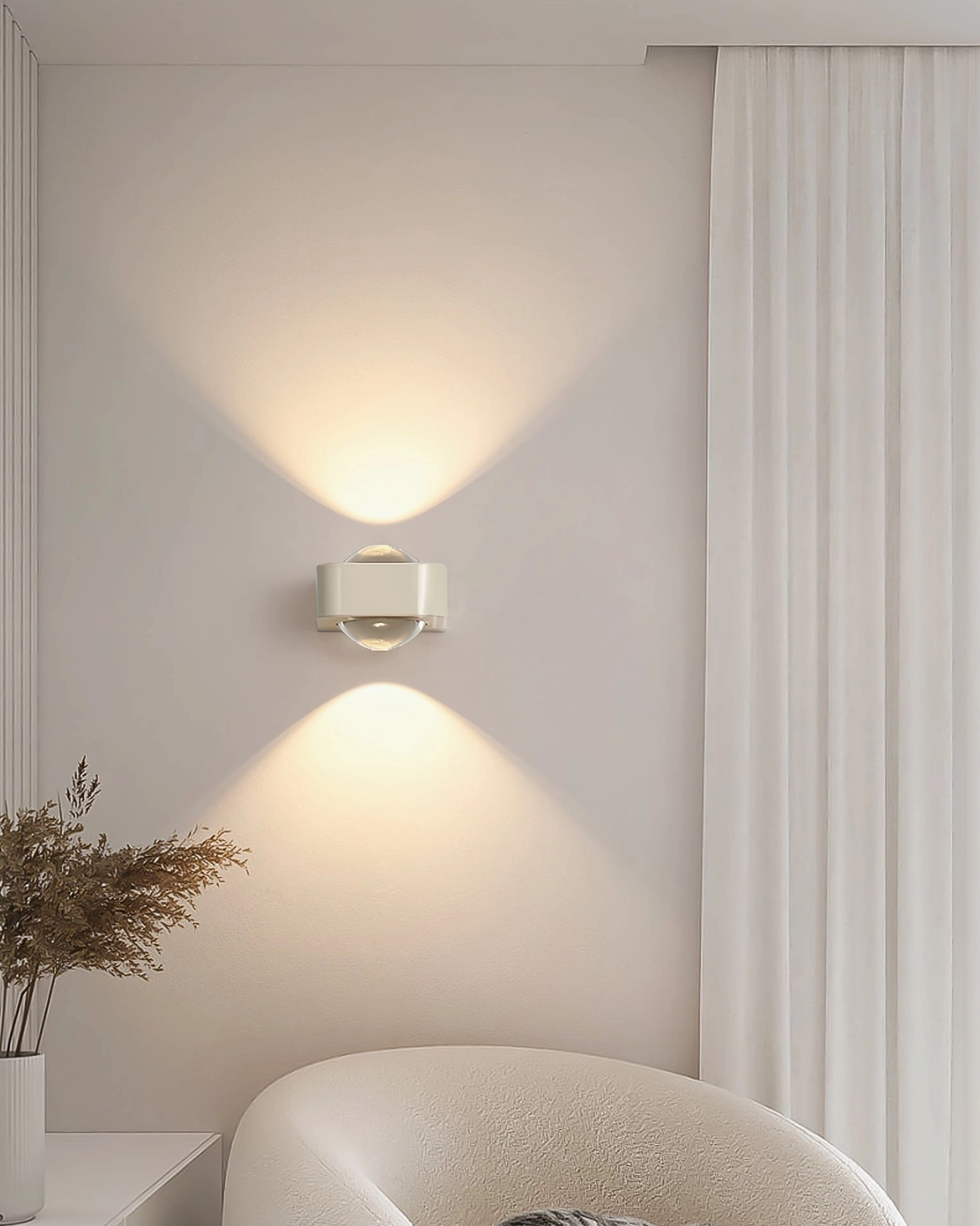 Cream Grace wall lamp creating cozy ambient light in modern living room corner