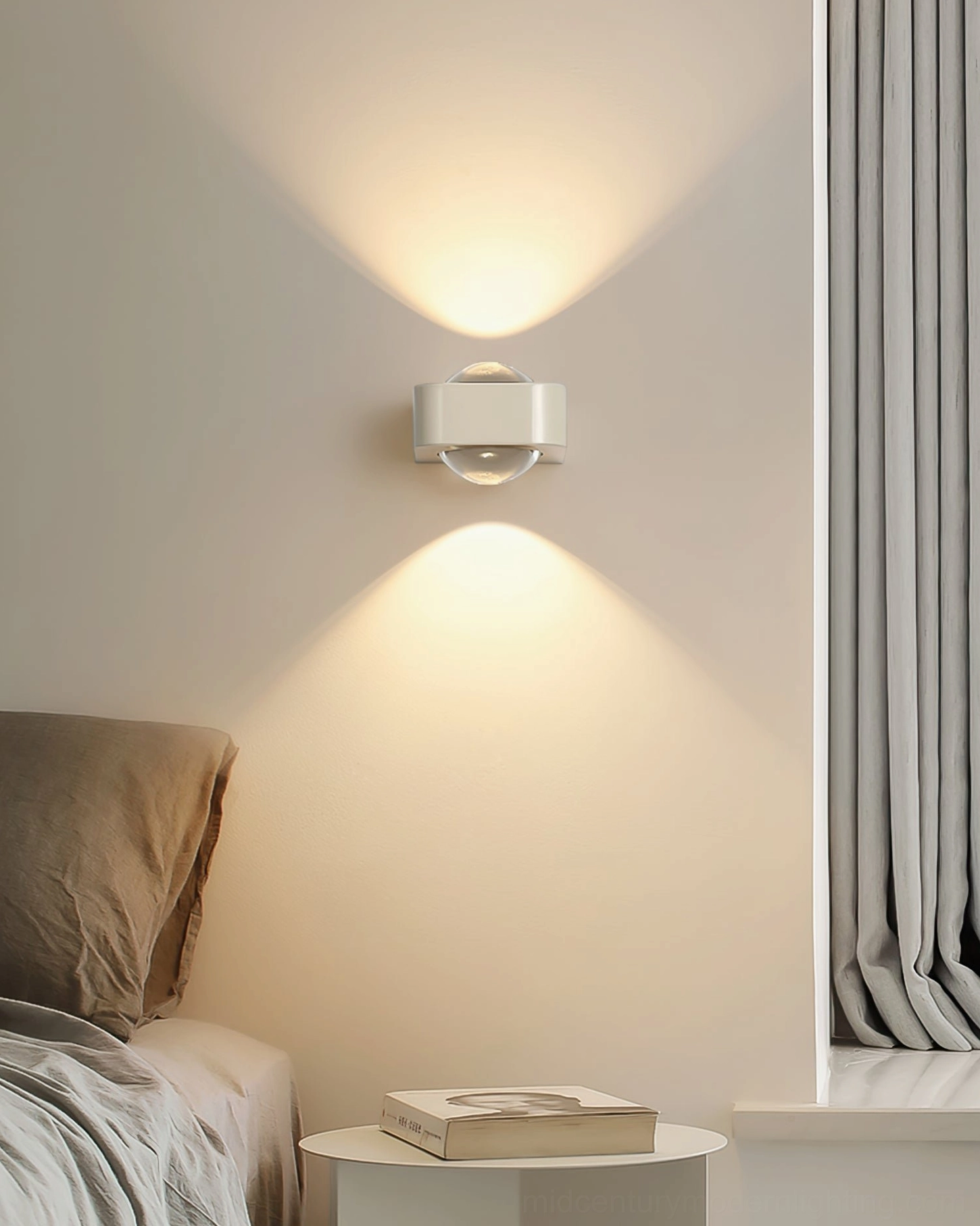 Silver Grace wall sconce providing soft warm ambient bedroom lighting