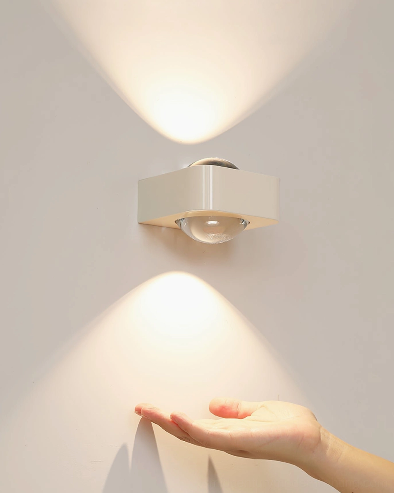 Cream Grace wall sconce showing dual up-down ambient lighting effect