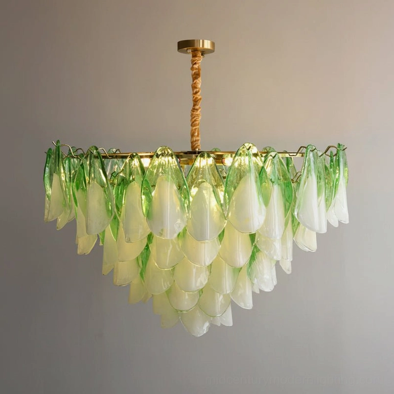 Full view of green clear gold foliage glass chandelier in contemporary dining setting