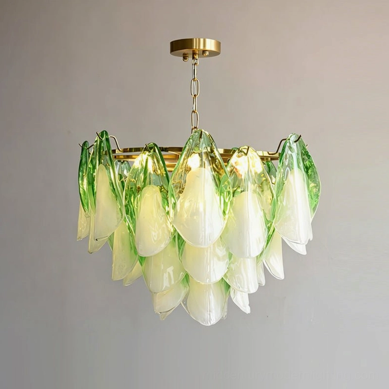 Green gradient glass foliage chandelier with lit warm interior lighting ambiance