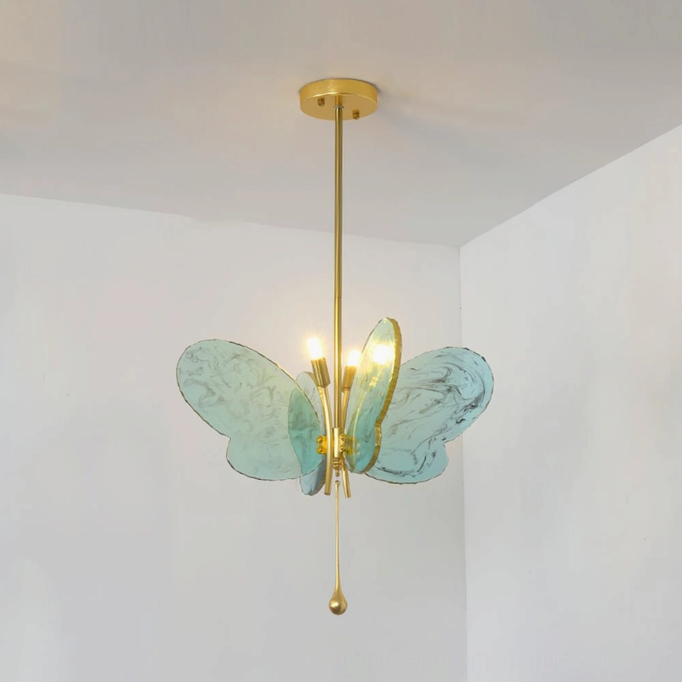 Green marbled butterfly pendant chandelier with warm LED lighting, displayed in white bedroom interior