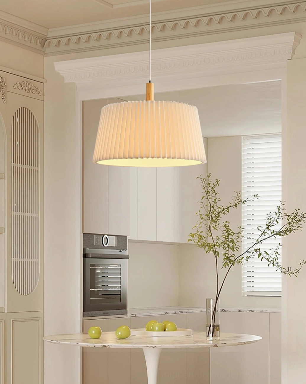 GT6 pleated ceiling pendant in French-style kitchen dining space with warm minimalist aesthetic