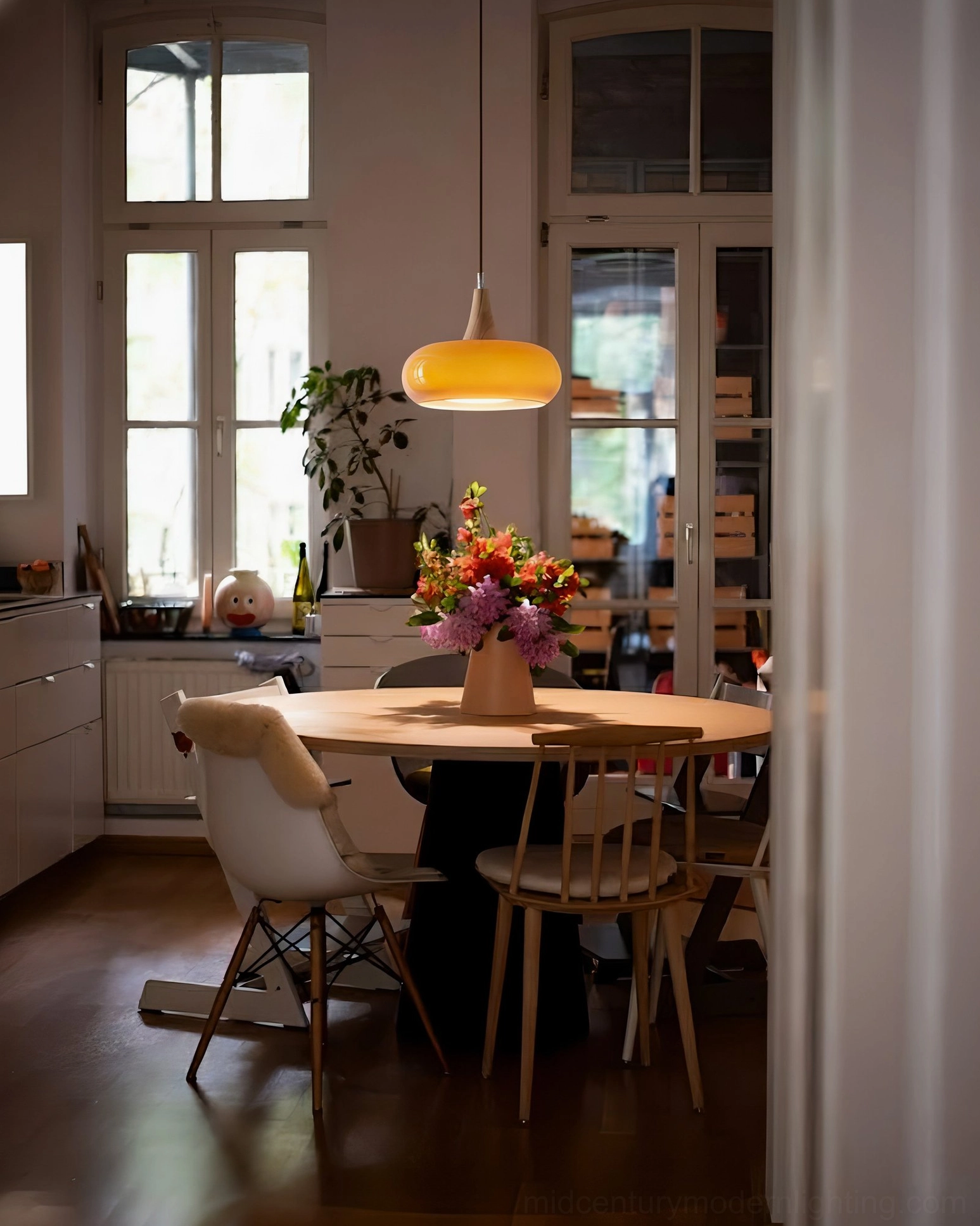 Hailie pendant lamps in open concept kitchen dining area, mid-century modern interior setting