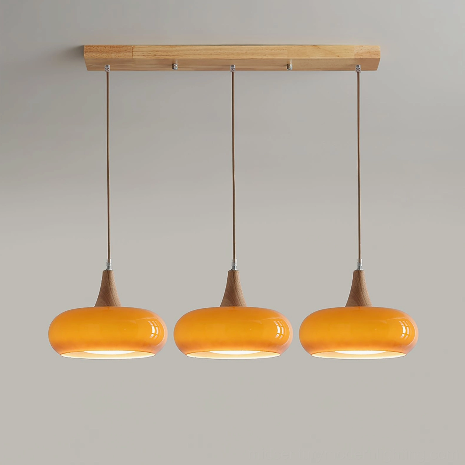 Hailie pendant lamp warm light temperature amber glass shade close-up detail