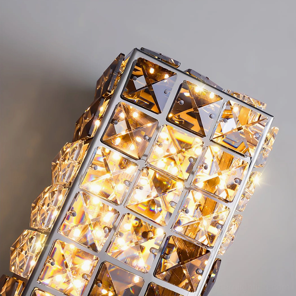 Hand-cast crystal wall sconce highlighting architectural light refraction and contemporary styling