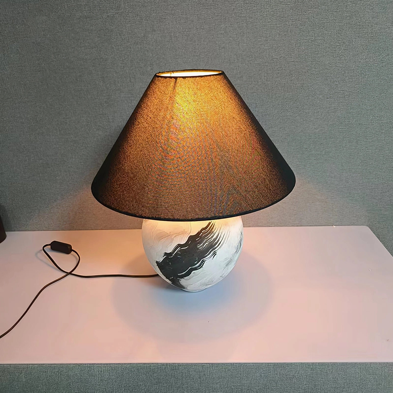 Hand-crafted ceramic lamp base with artistic painting details and metal fixture assembly