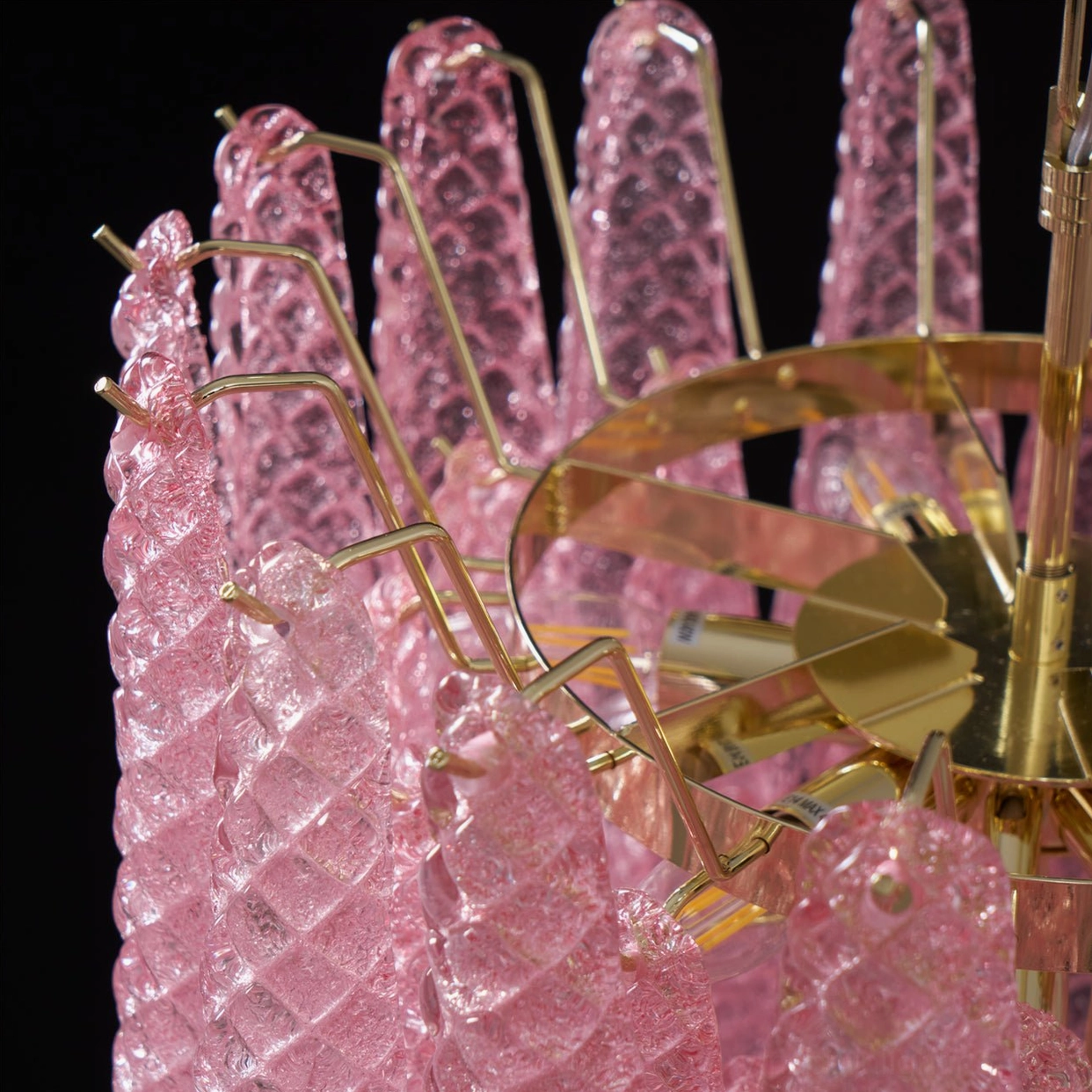 Hand-crafted pink glass chandelier design detail showing teardrop cascade arrangement