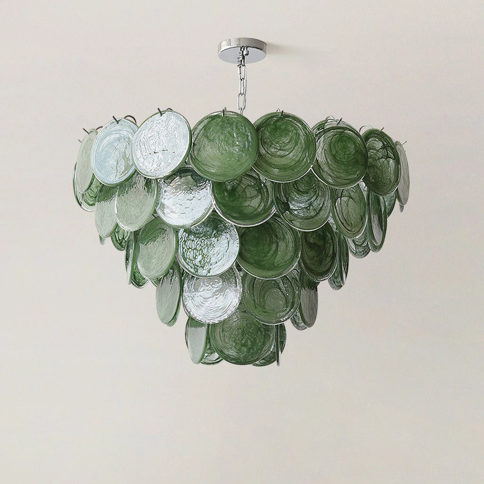 Close-up of Verde tiered glass disc chandelier showing rippled texture and deep green color variations