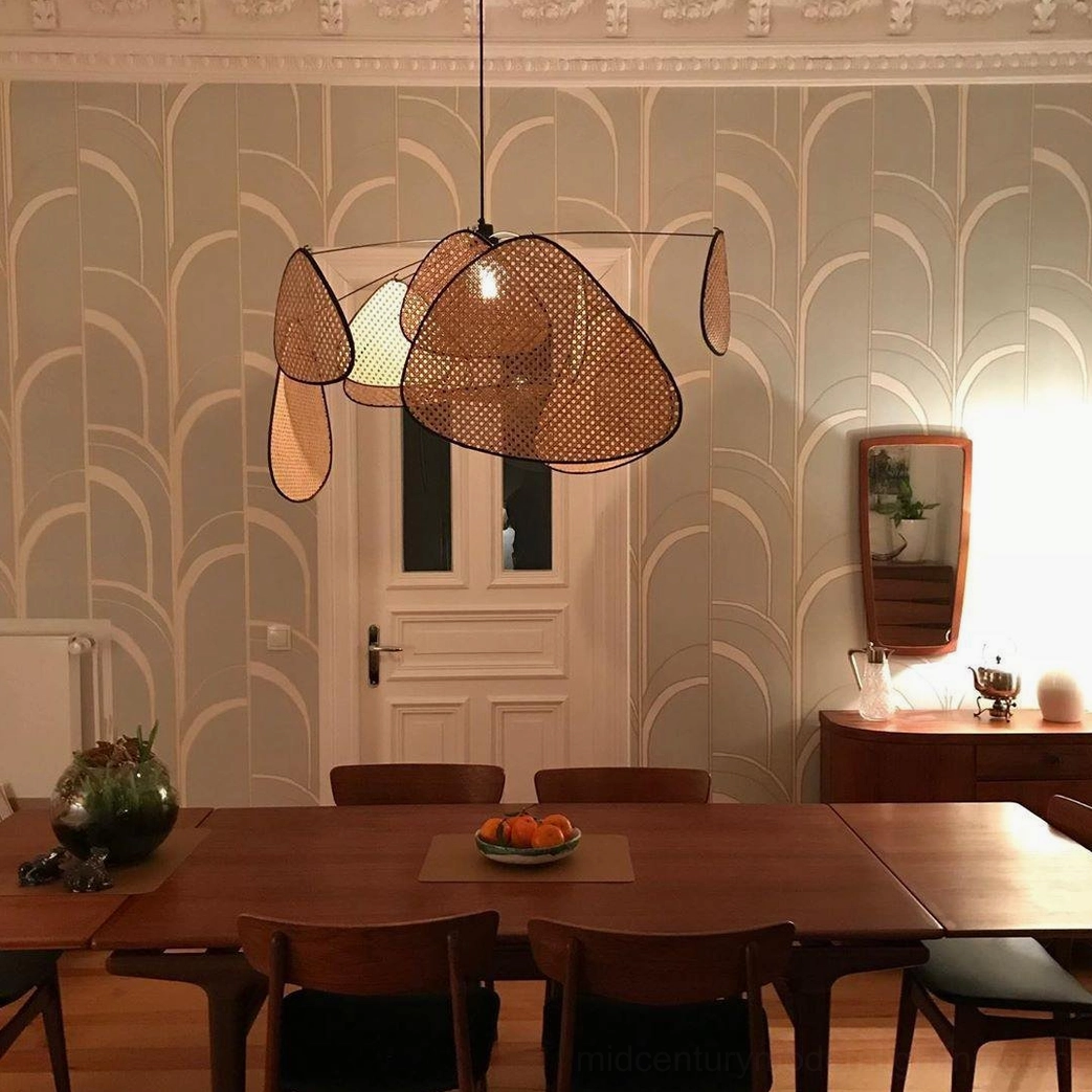 Handcrafted rattan pendant light, showing natural material texture and artisanal weaving technique