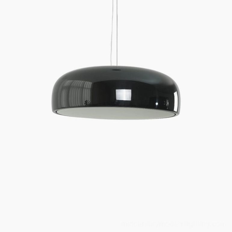 Black Harper dome pendant in compact space, small-scale mid-century modern fixture demonstrating bedroom or office versatility