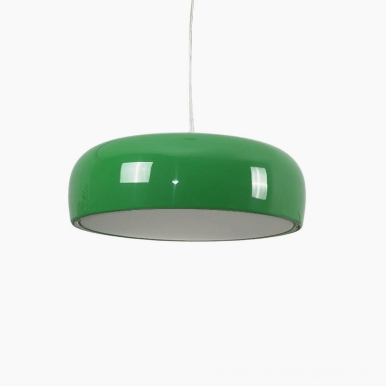 Green Harper pendant light in contemporary space, vibrant dome shade with matching ceiling canopy in nature-inspired color