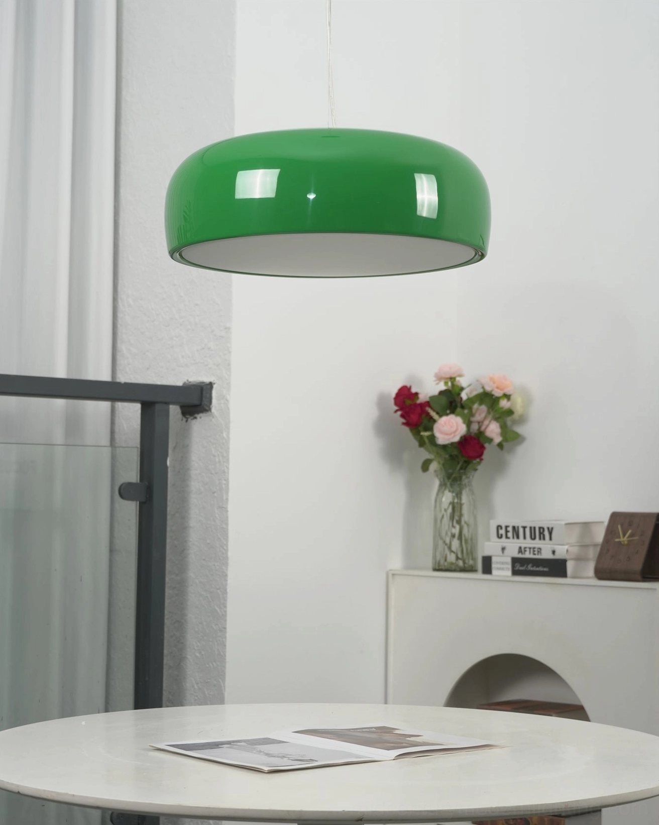 Harper pendant light fixture in contemporary interior setting, showing bulb configuration and light diffusion through dome shade
