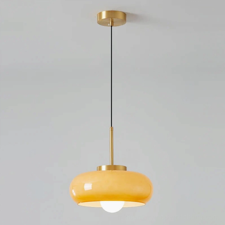 Harvey mid-century pendant ceiling lamp direct front view featuring orange amber glass orb shade, minimalist design