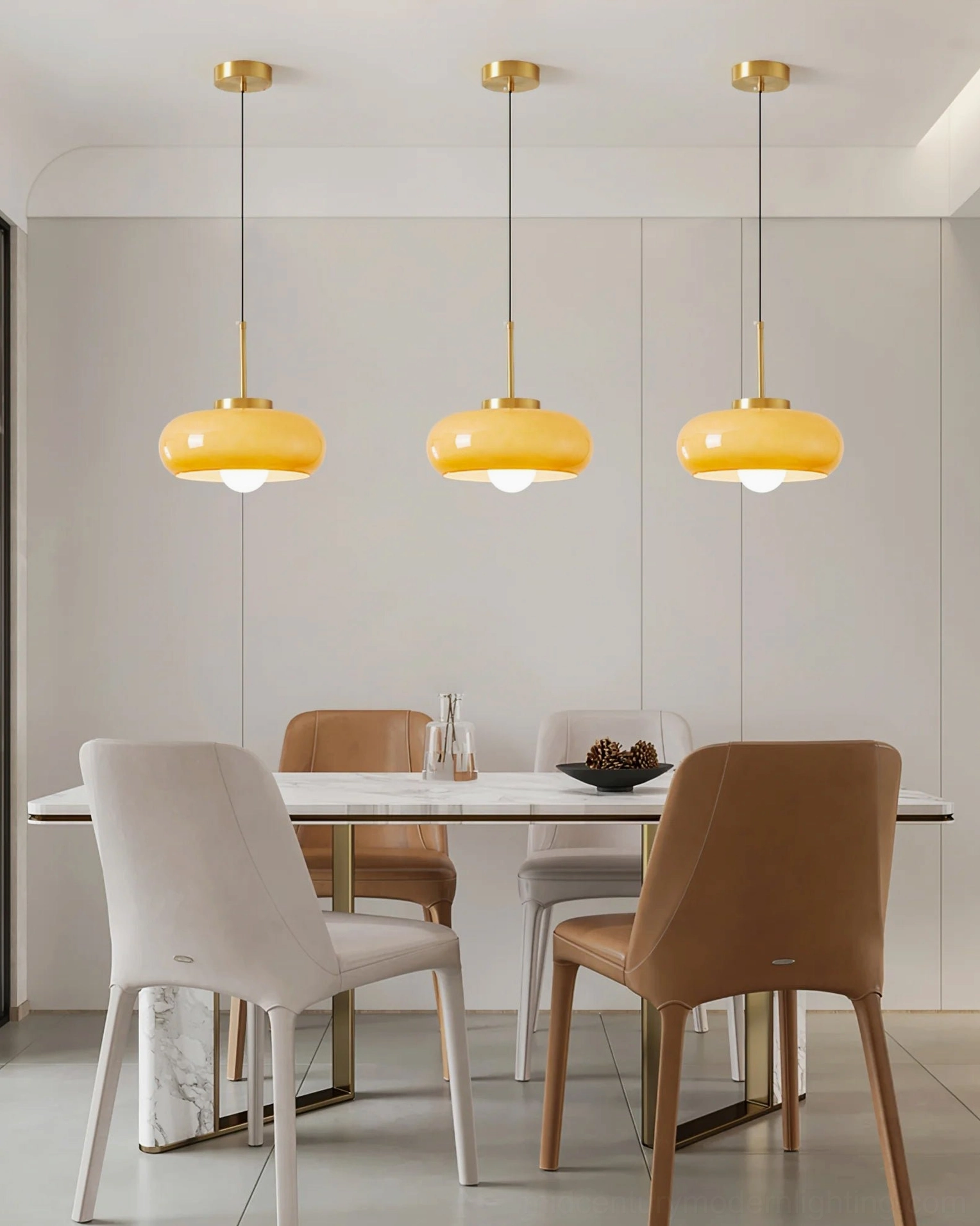 Three Harvey mid-century modern pendant lights clustered over dining table, minimalist warm-toned interior design
