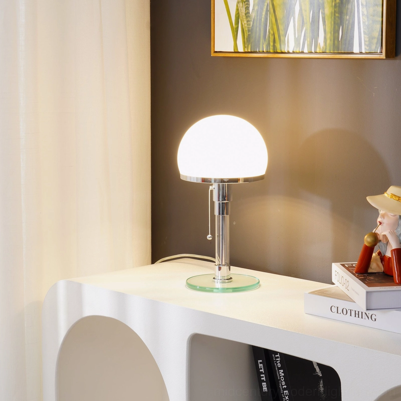Hemispherical chrome table lamp detailed view of frosted glass dome and metal construction, mid-century modern design detail