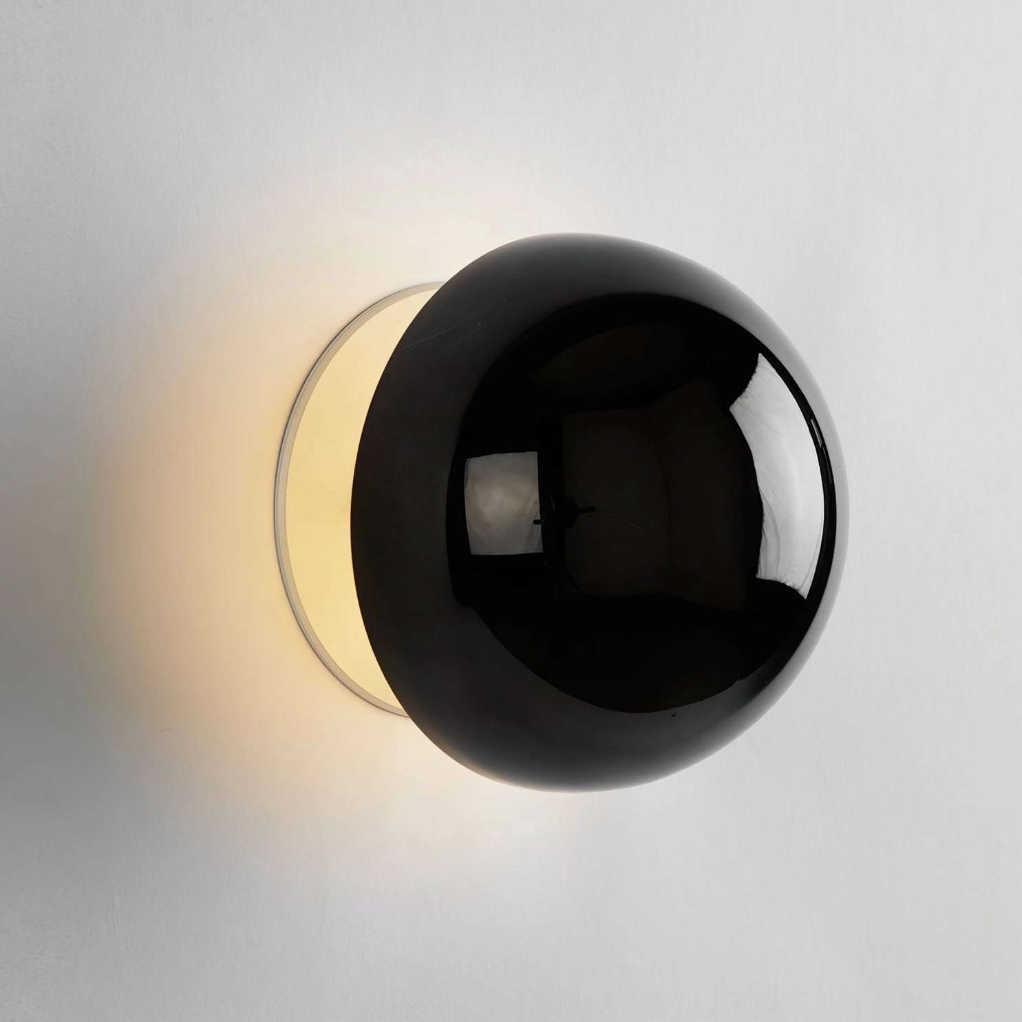 Modern adjustable wall sconce with hemispherical metal dome and integrated LED