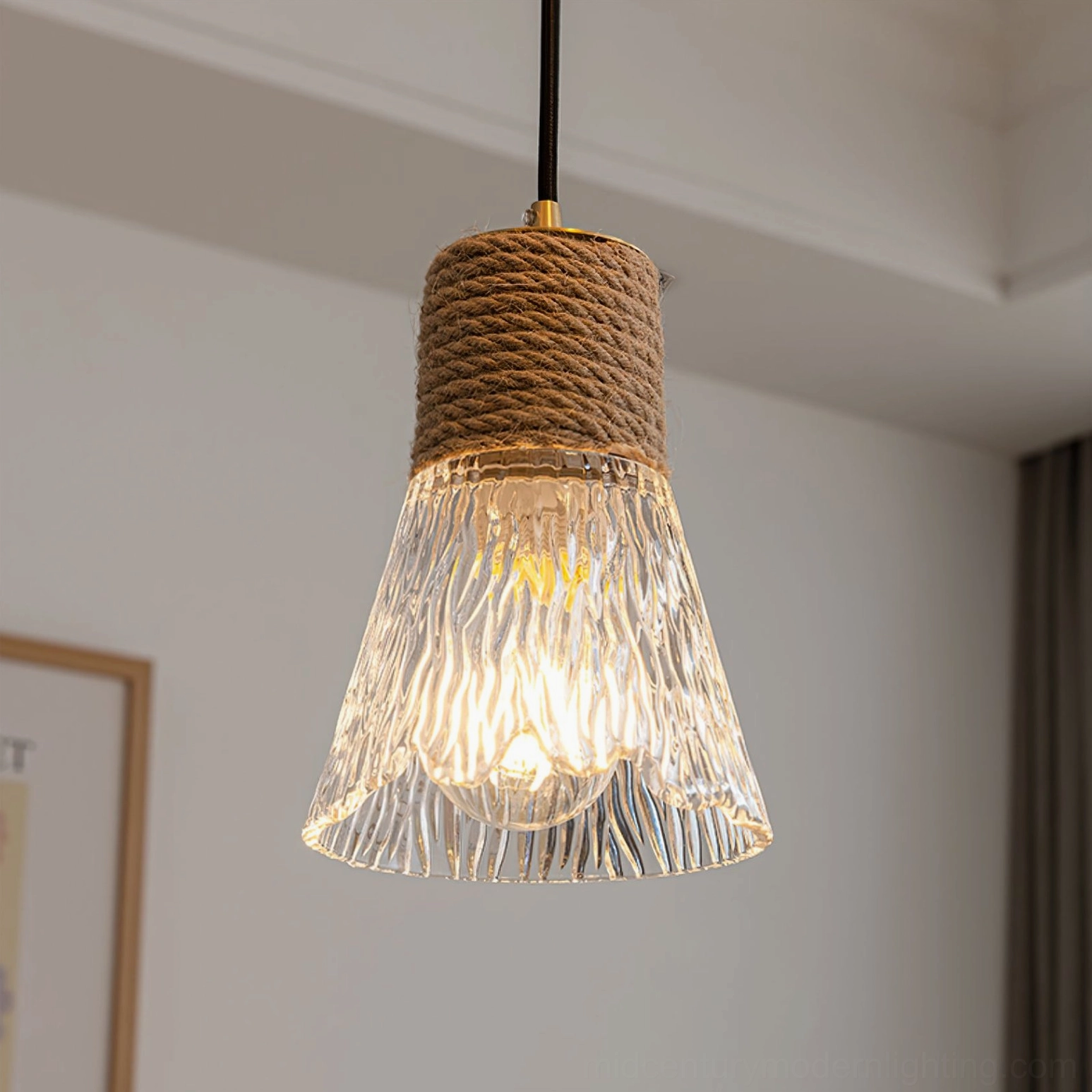Hemp rope glass pendant in contemporary living space, warm diffused lighting for transitional interior design