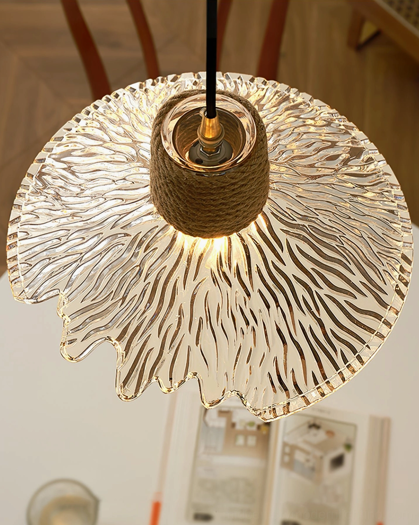 Hemp rope glass pendant fixture in farmhouse kitchen setting, functional and decorative pendant lighting solution