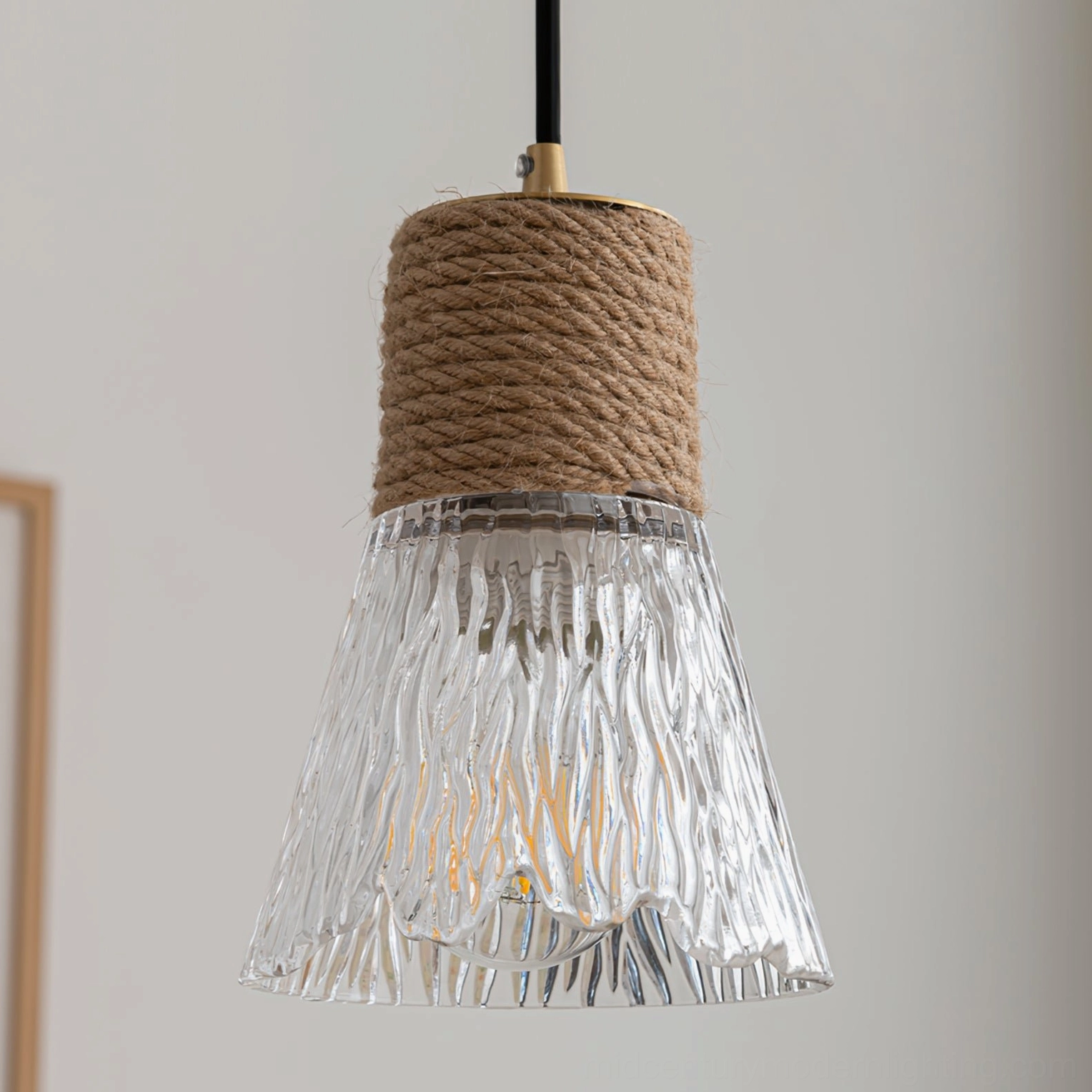 Hemp rope glass pendant lamp in natural daylight, showing rope texture and glass frosting clarity and warmth