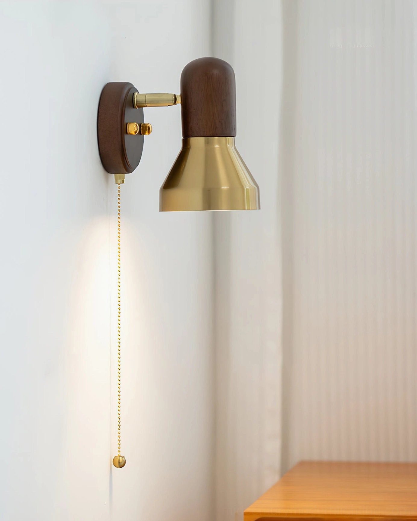 Side view of compact retro Heron wall sconce in corner with wooden furniture