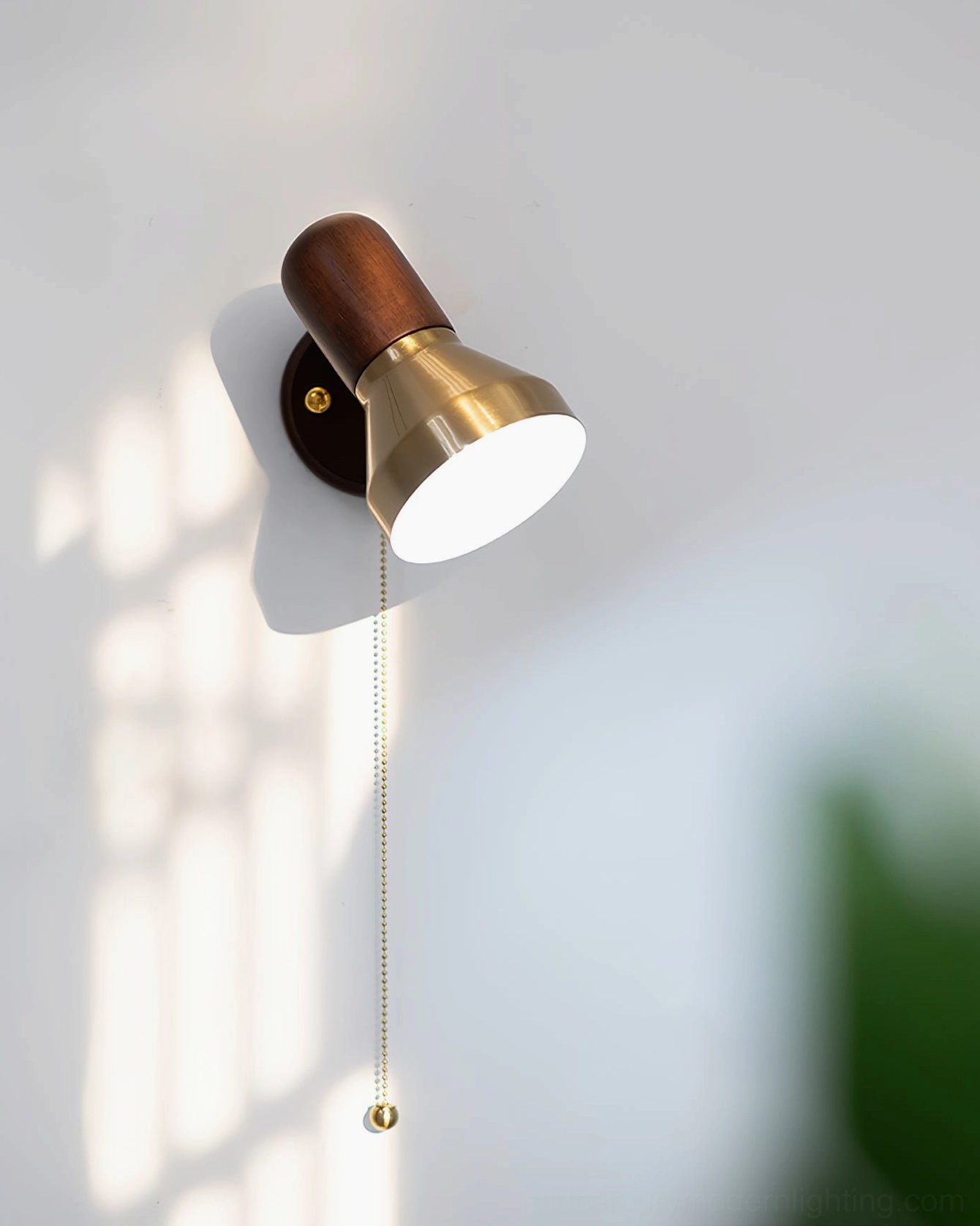Artistic detail shot of Heron wall light emphasizing minimalist design and material contrast
