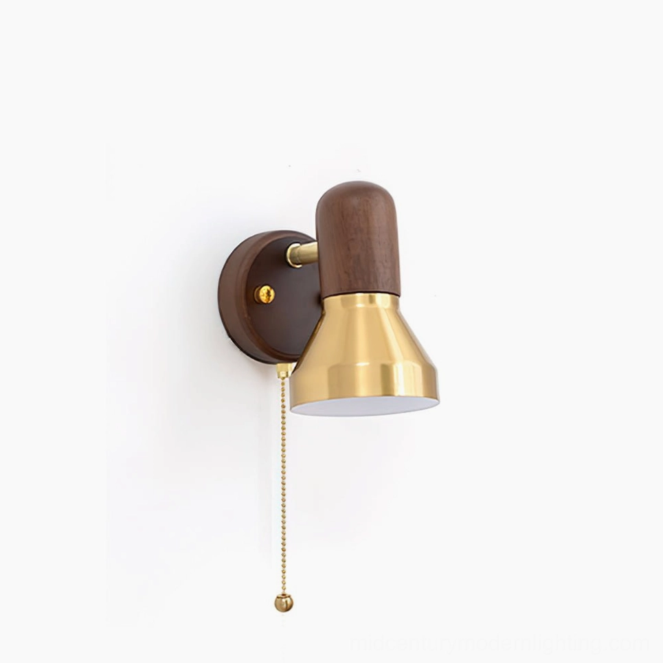 Heron mid-century modern wall sconce with brass shade and walnut wood base, front studio view