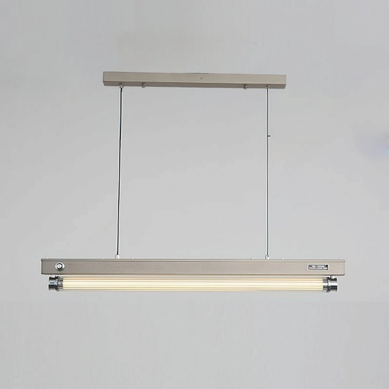 Hiromi compact linear pendant light suspended showing balanced proportions and warm glow