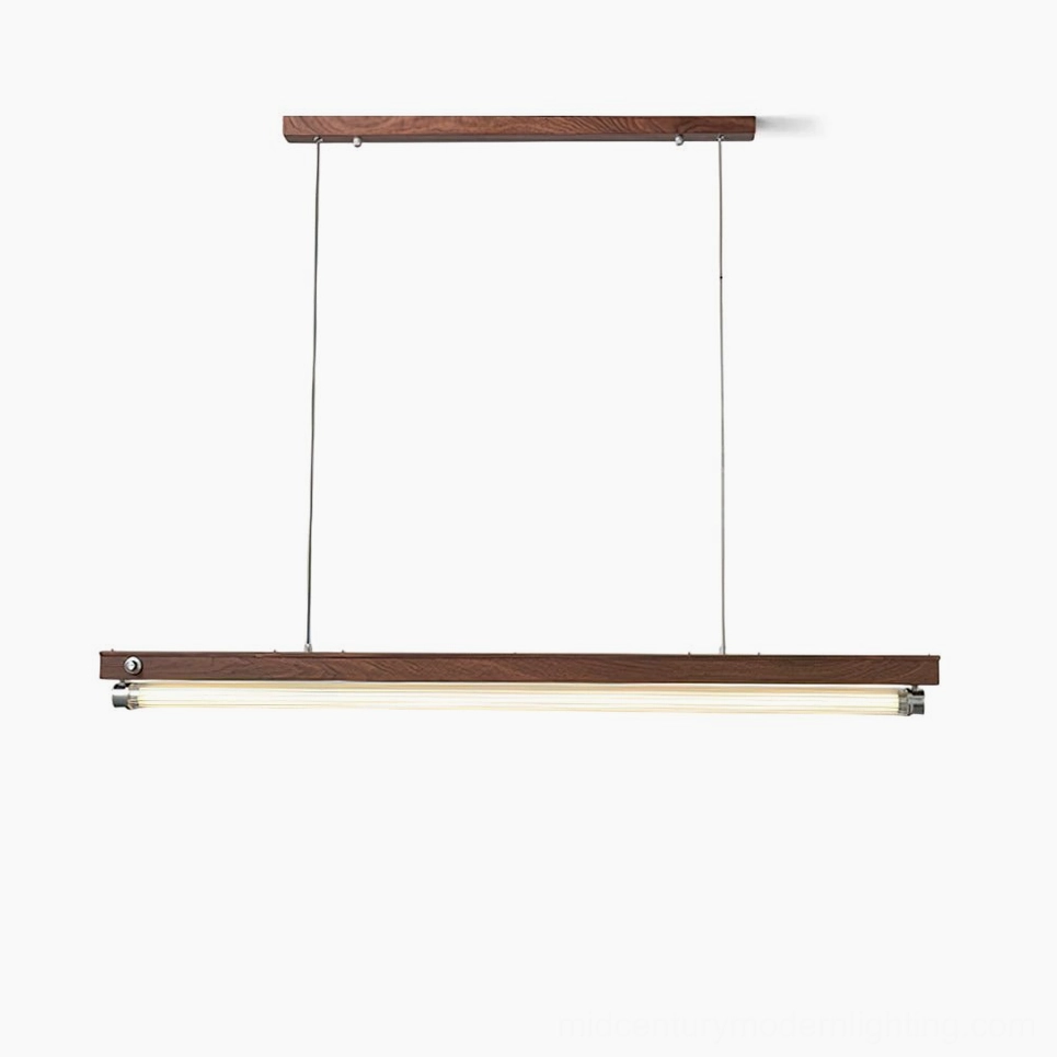 Hiromi linear pendant light in walnut wood finish suspended from adjustable cables against white studio background