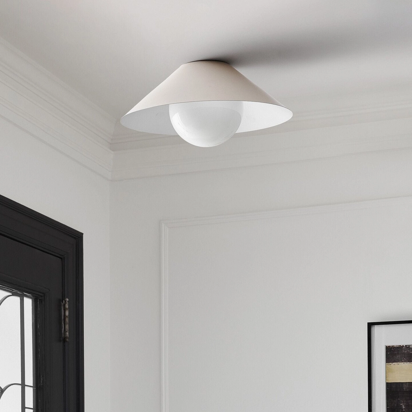 Warm white Hood Coolie conical shade flush mount ceiling light in minimalist room setting