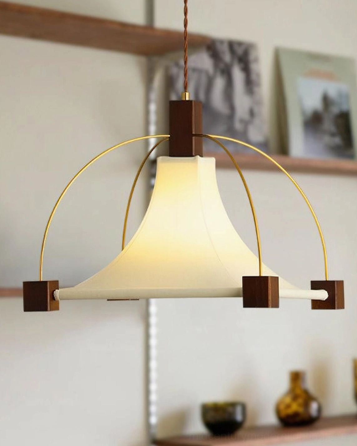 Illuminated fabric pendant light shelf display warm ambient lighting