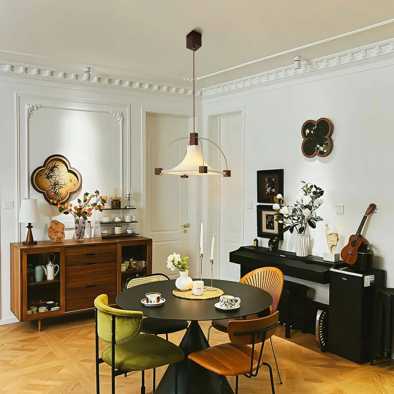 Pendant light illuminating French vintage dining room setting